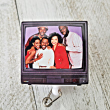 Load image into Gallery viewer, reflections by zana african american badge retractable id badge holder martin tv show our black F.R.I.E.N.D.S ID badge reel pins martin fan gear black F.R.I.E.N.D.S accessory TV show-themed badge holder badge reel or pins martin TV show merchandise unique badge reel design our black F.R.I.E.N.D.S pins TV show-inspired badge accessory badge holder for martin fans martin pride nostalgic TV show accessory black F.R.I.E.N.D.S badge reel pins for martin enthusiasts
