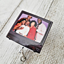 Load image into Gallery viewer, reflections by zana african american badge retractable id badge holder martin tv show our black F.R.I.E.N.D.S ID badge reel pins martin fan gear black F.R.I.E.N.D.S accessory TV show-themed badge holder badge reel or pins martin TV show merchandise unique badge reel design our black F.R.I.E.N.D.S pins TV show-inspired badge accessory badge holder for martin fans martin pride nostalgic TV show accessory black F.R.I.E.N.D.S badge reel pins for martin enthusiasts
