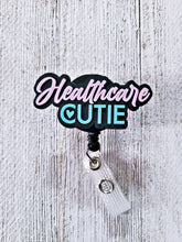 Load image into Gallery viewer, HC Cutie Pink/Blue Badge Reel
