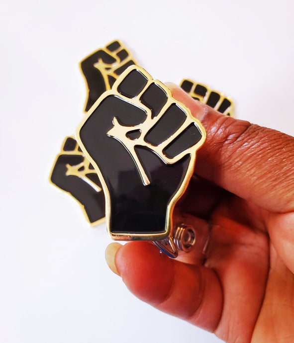 Black Fist Badge Reel